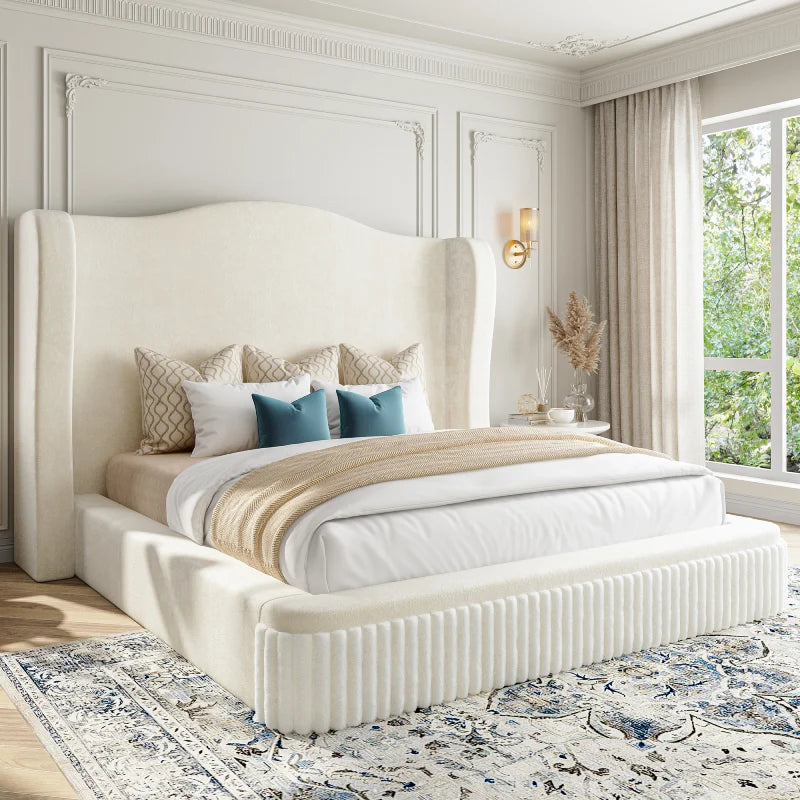 Designed as a stylish upholstered platform bed, this bed frame combines full-body cushioning with a sophisticated wingback silhouette for a cozy and elevated bedroom aesthetic.