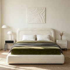 This cloud bed frame with headboard features a soft upholstered design and rounded silhouette for a cozy, modern bedroom.